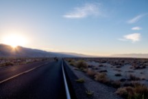 On the road before sunrise to start our desert crossing towards Death Valley. Near Lone Pine, CA, USA